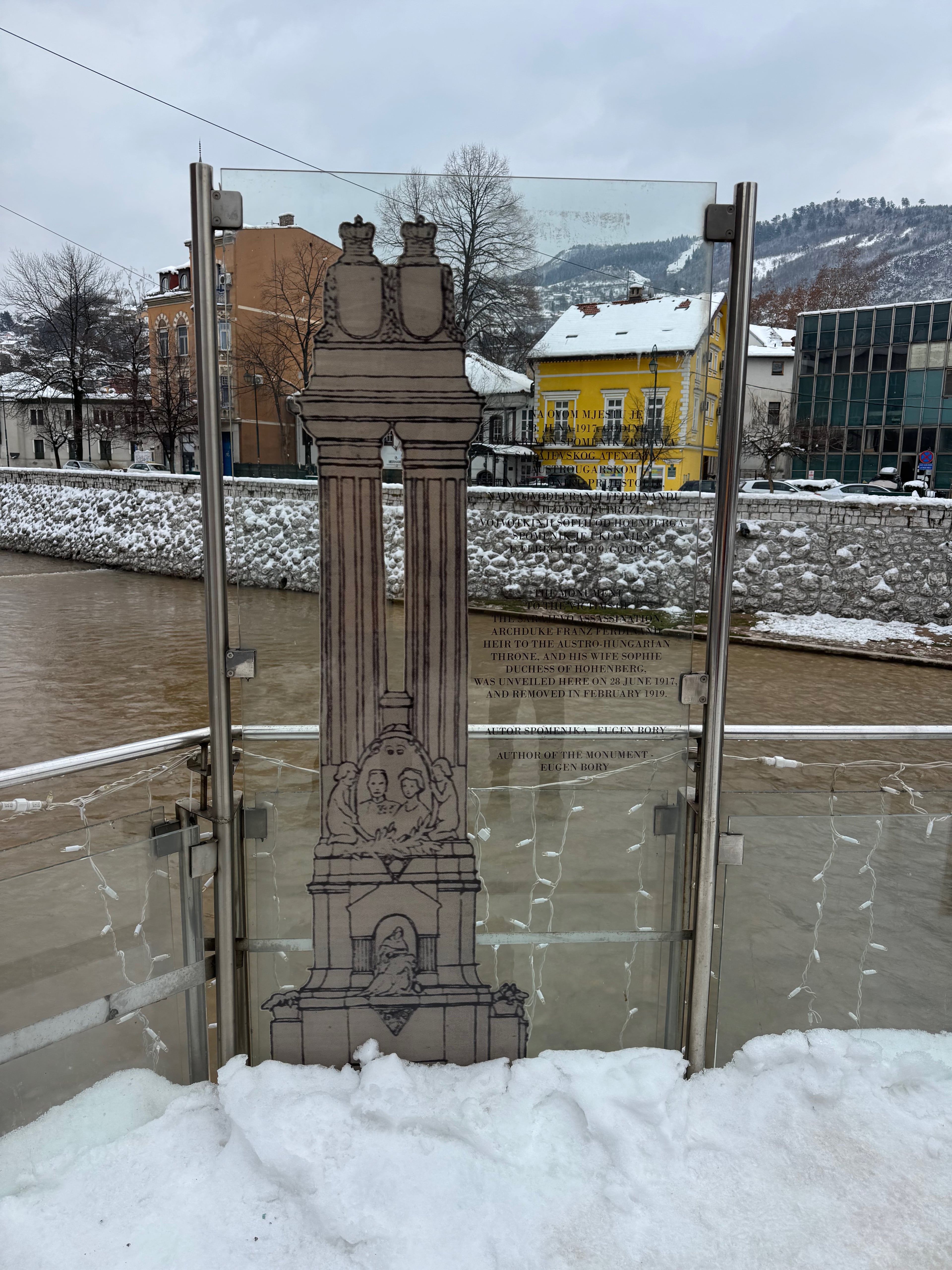 Assassination-site marker beside Latin Bridge and the Miljacka River in Sarajevo.