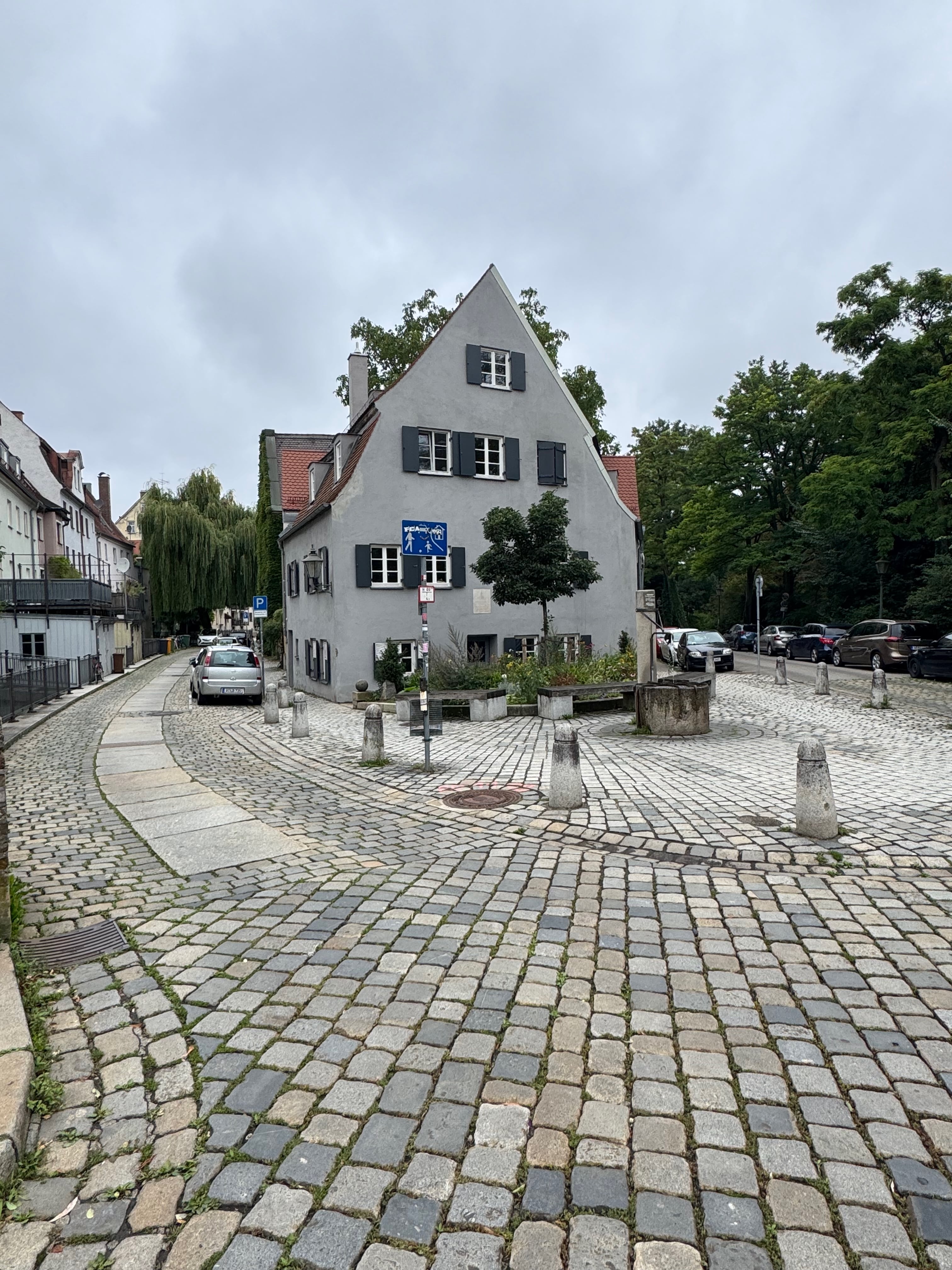 Cobblestone lane near the Red Gate waterworks in Augsburg.