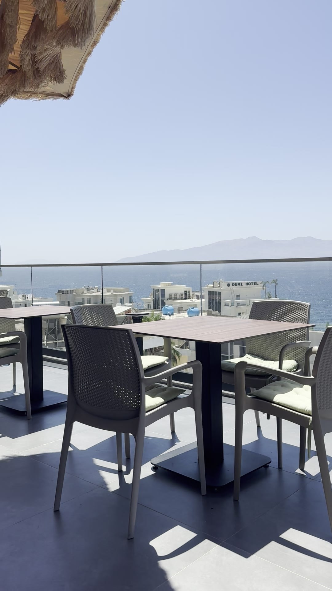 Tables above the bay at Julia Rooftop Lounge in Sarandë