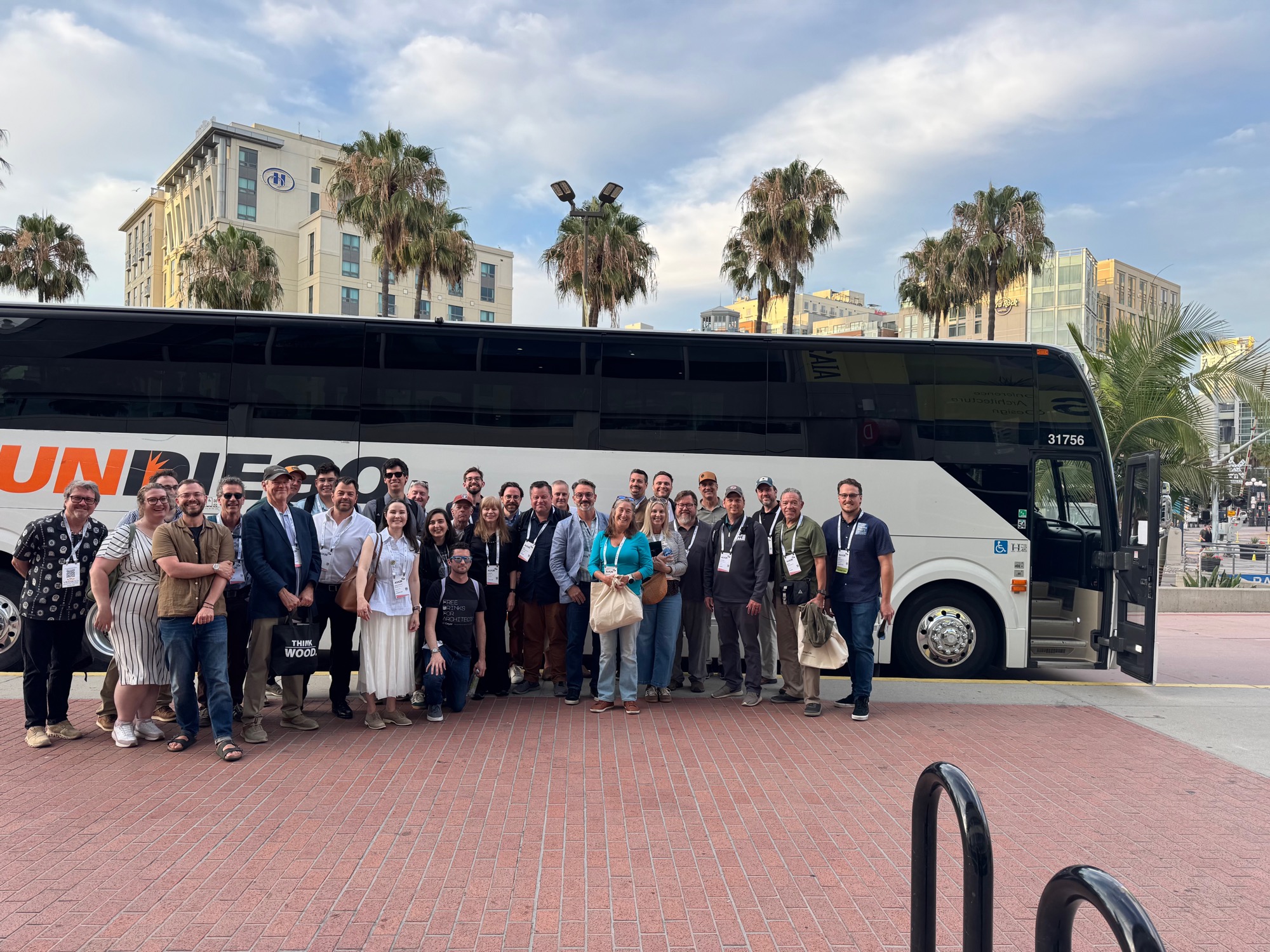 Group portrait of the AIA Sustainability on Tap tour at the bus pickup, San Diego, 2026.